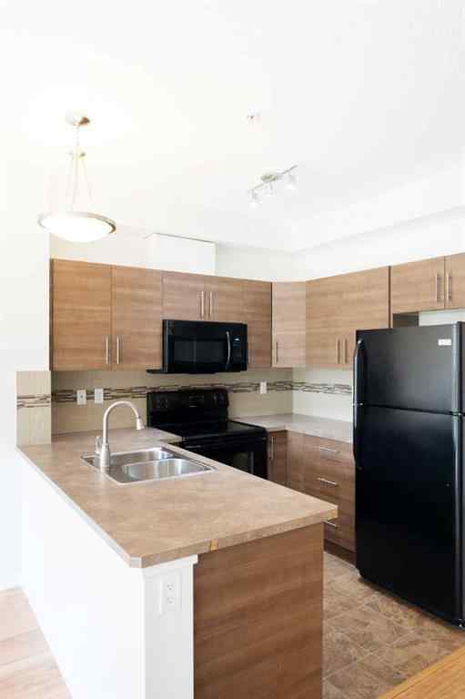 MLS® A2226872 - Unit #111 207 Sunset Drive  in Sunset Ridge Cochrane, Residential