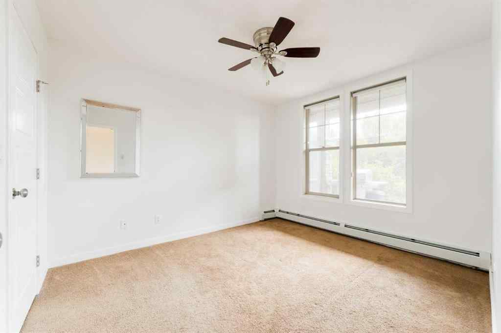 MLS® A2226872 - Unit #111 207 Sunset Drive  in Sunset Ridge Cochrane, Residential