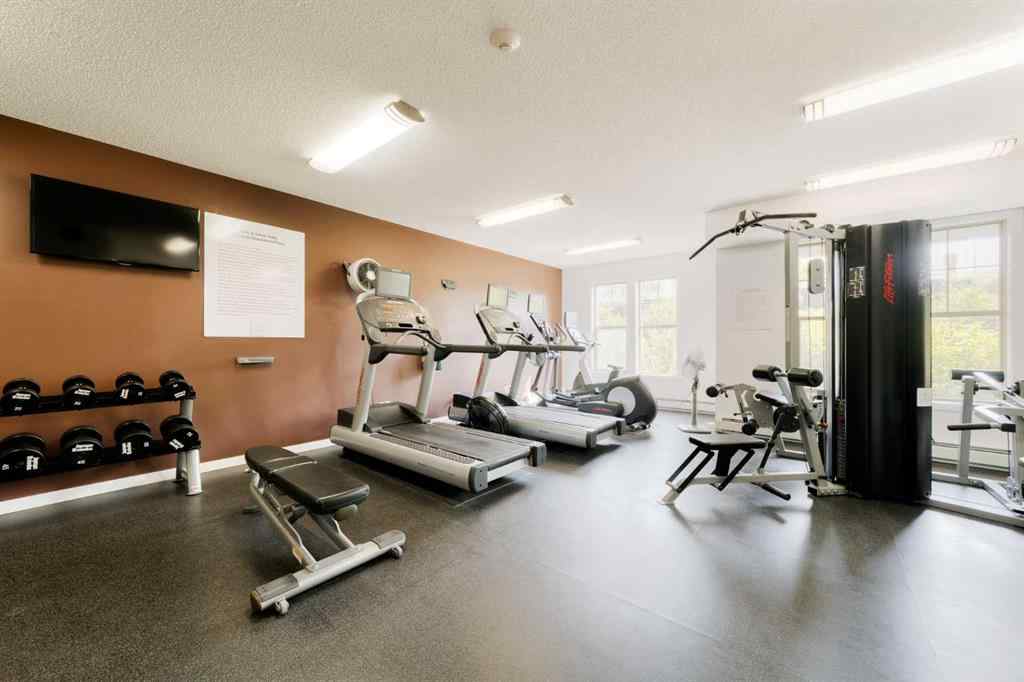 MLS® A2226872 - Unit #111 207 Sunset Drive  in Sunset Ridge Cochrane, Residential