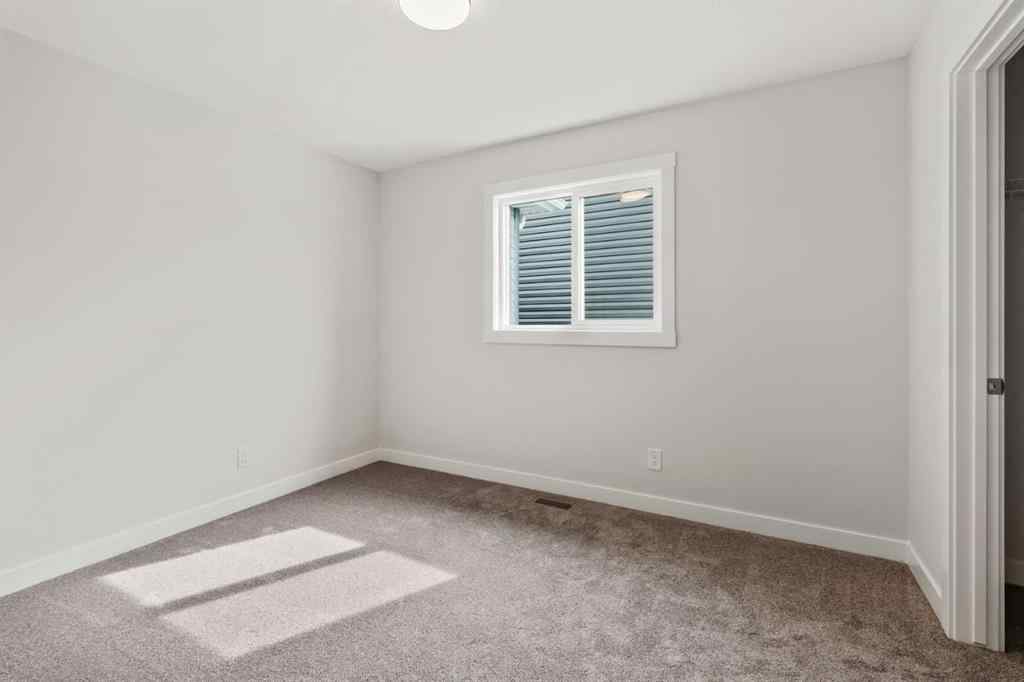 MLS® A2226923 - 223 Creekstone Circle SW in Pine Creek Calgary, Residential