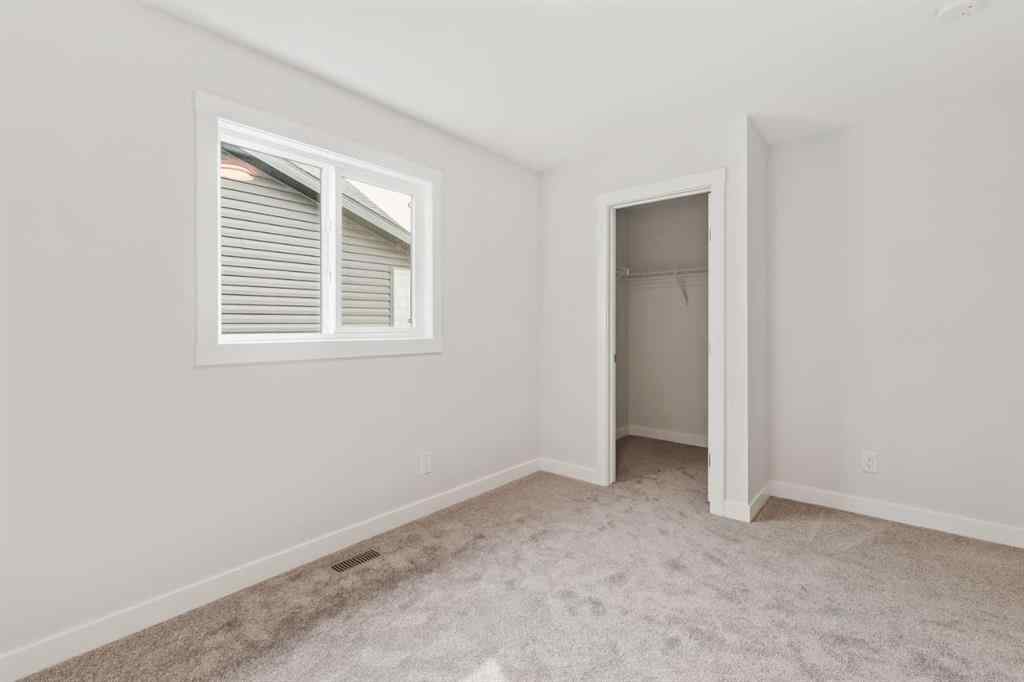 MLS® A2226923 - 223 Creekstone Circle SW in Pine Creek Calgary, Residential