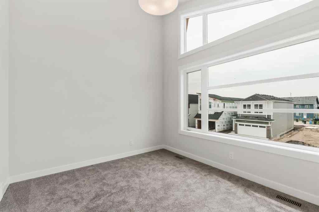 MLS® A2226923 - 223 Creekstone Circle SW in Pine Creek Calgary, Residential