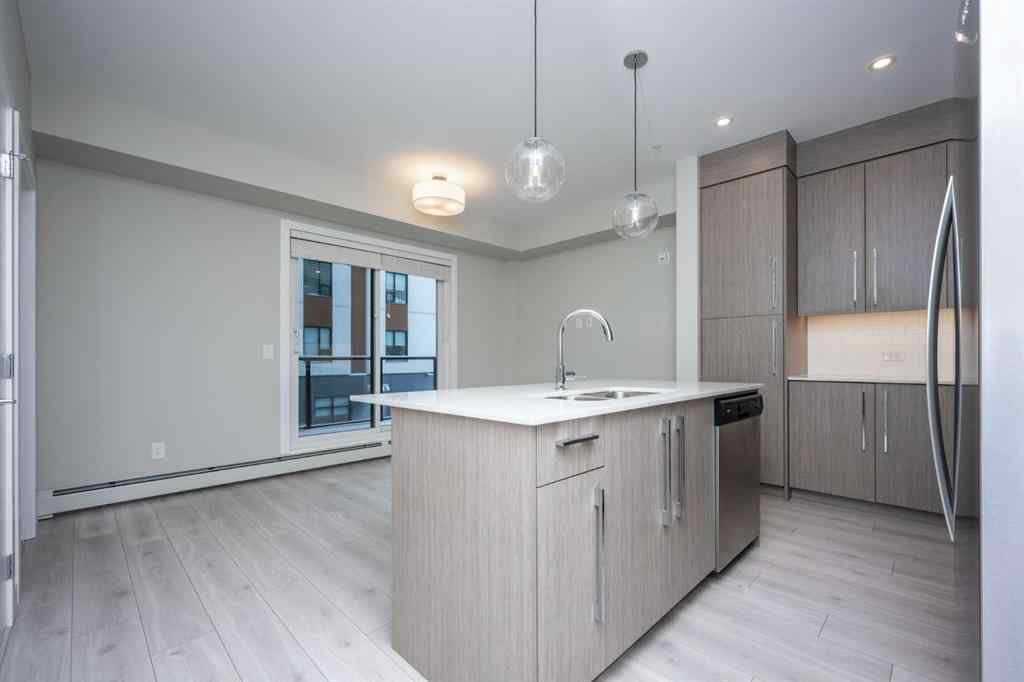 MLS® A2227083 - Unit #217 383 Smith Street NW in University District Calgary, Residential