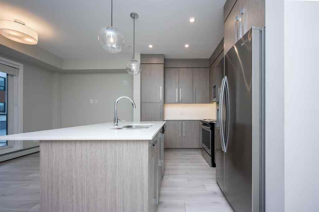 MLS® A2227083 - Unit #217 383 Smith Street NW in University District Calgary, Residential