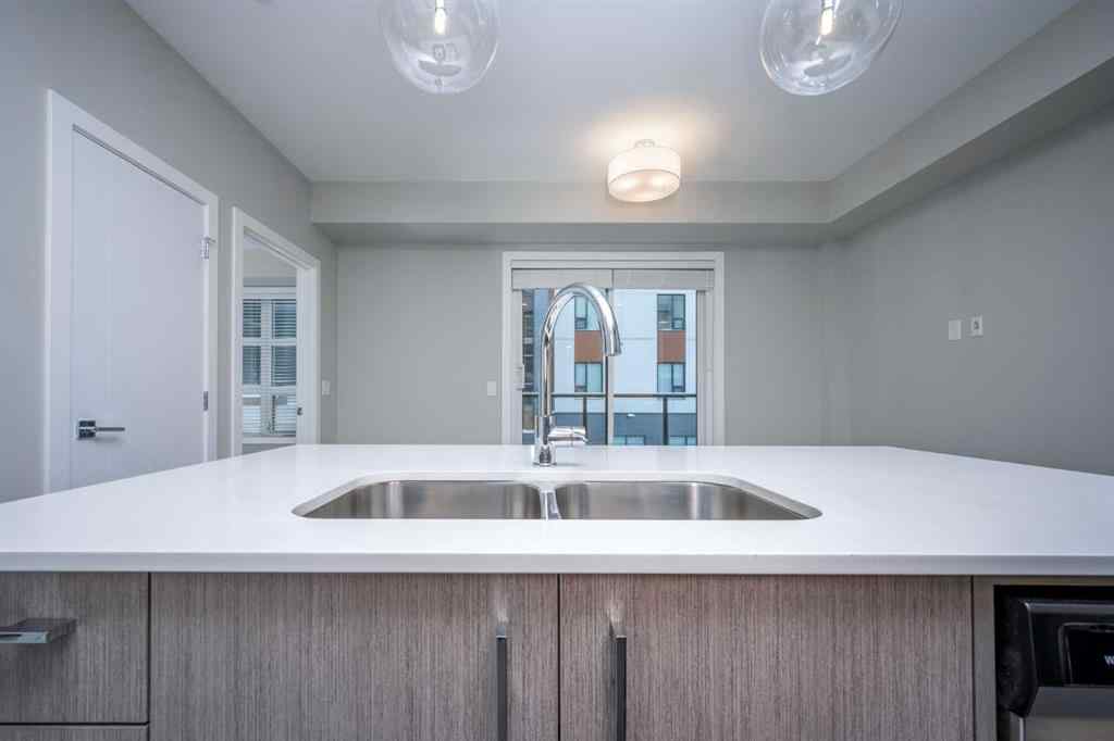 MLS® A2227083 - Unit #217 383 Smith Street NW in University District Calgary, Residential