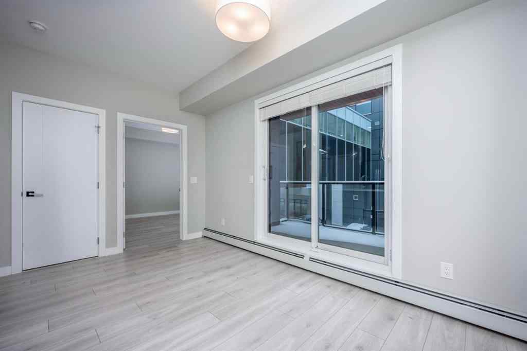 MLS® A2227083 - Unit #217 383 Smith Street NW in University District Calgary, Residential