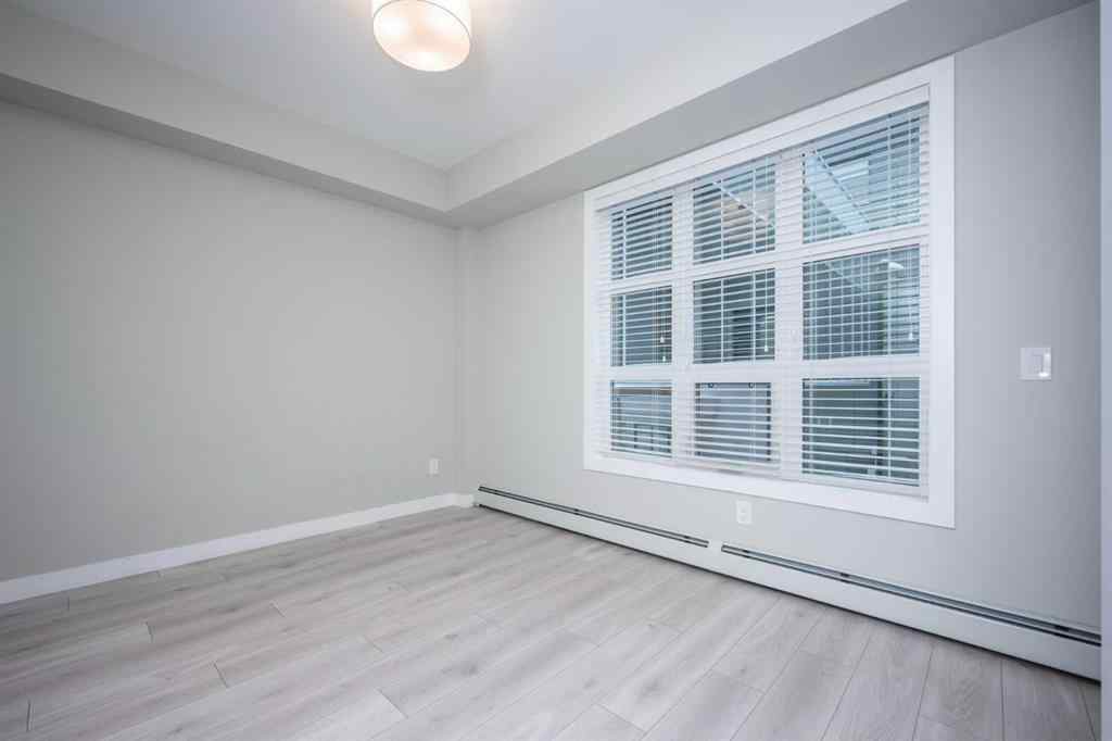 MLS® A2227083 - Unit #217 383 Smith Street NW in University District Calgary, Residential