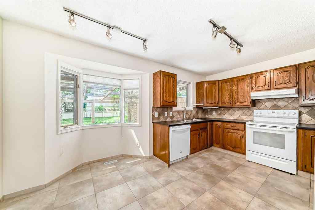 MLS® A2227257 - 139 Stratton Crescent SW in Strathcona Park Calgary, Residential