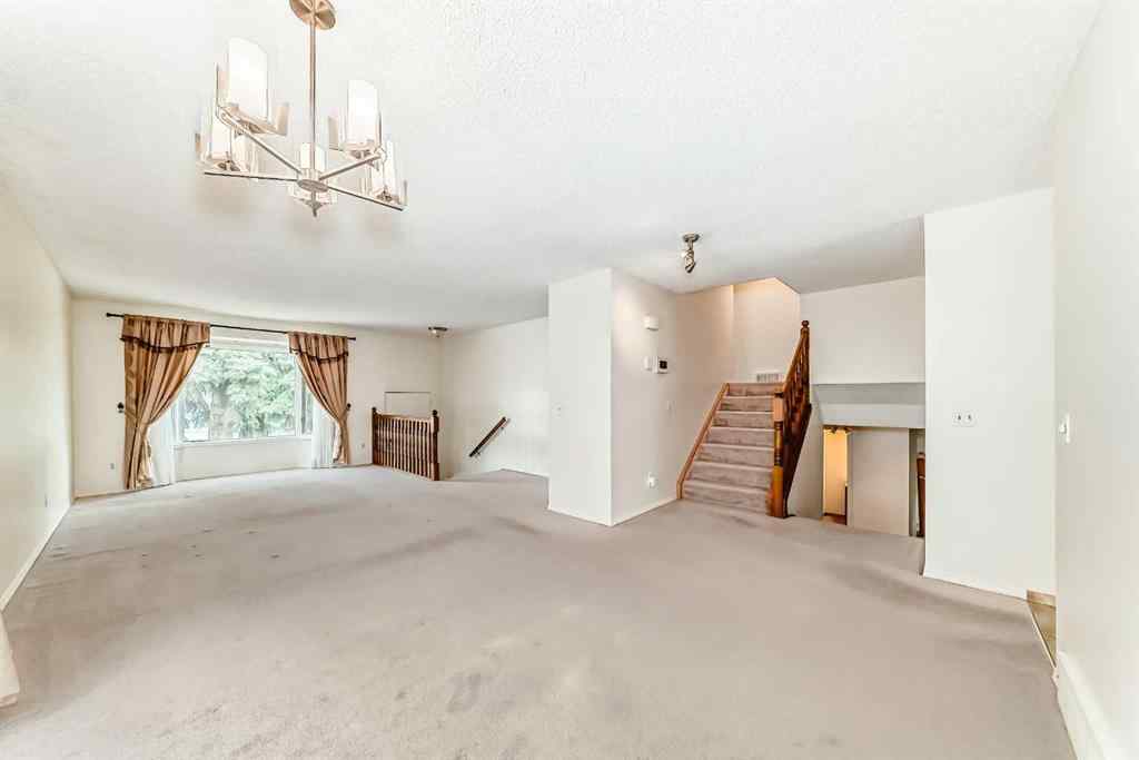 MLS® A2227257 - 139 Stratton Crescent SW in Strathcona Park Calgary, Residential