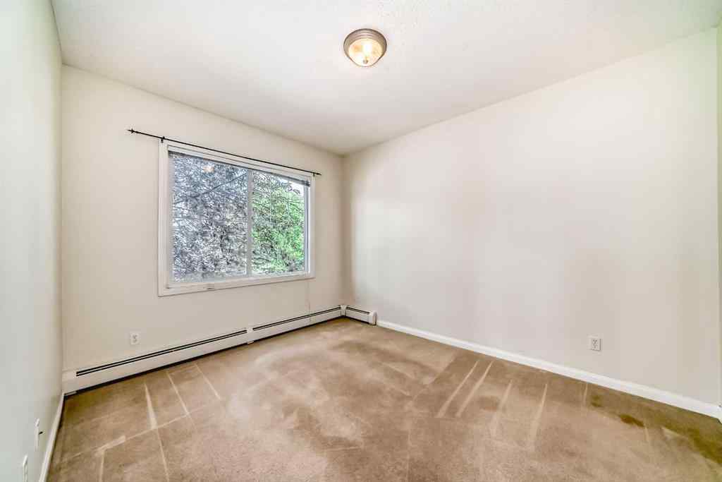 MLS® A2227287 - Unit #202 8 Prestwick Pond Terrace SE in McKenzie Towne Calgary, Residential