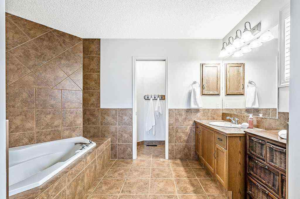 MLS® A2227289 - 105 Cimarron Park Circle  in Cimarron Okotoks, Residential