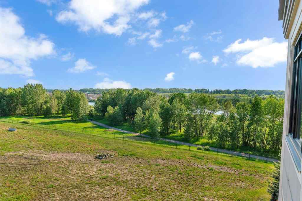 MLS® A2227451 - Unit #401 221 Quarry Way SE in Douglasdale/Glen Calgary, Residential