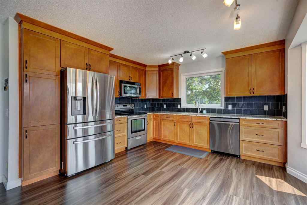 MLS® A2227619 - 711 High Country Drive NW in High River Golf Course High River, Residential