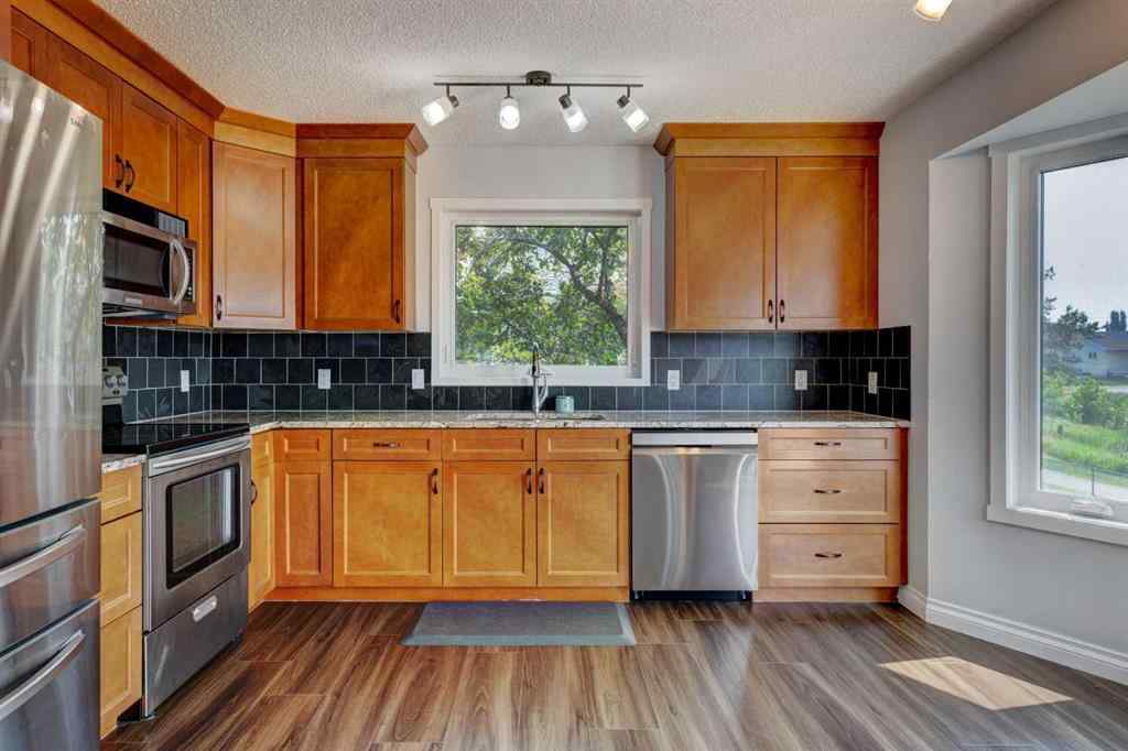 MLS® A2227619 - 711 High Country Drive NW in High River Golf Course High River, Residential