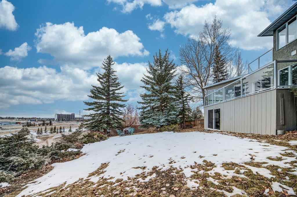 MLS® A2227854 - 2925 Signal Hill Heights SW in Signal Hill Calgary, Residential