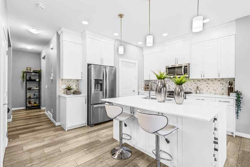 MLS® A2227864 - 1036 Chinook Gate Heath SW in Chinook Gate Airdrie, Residential