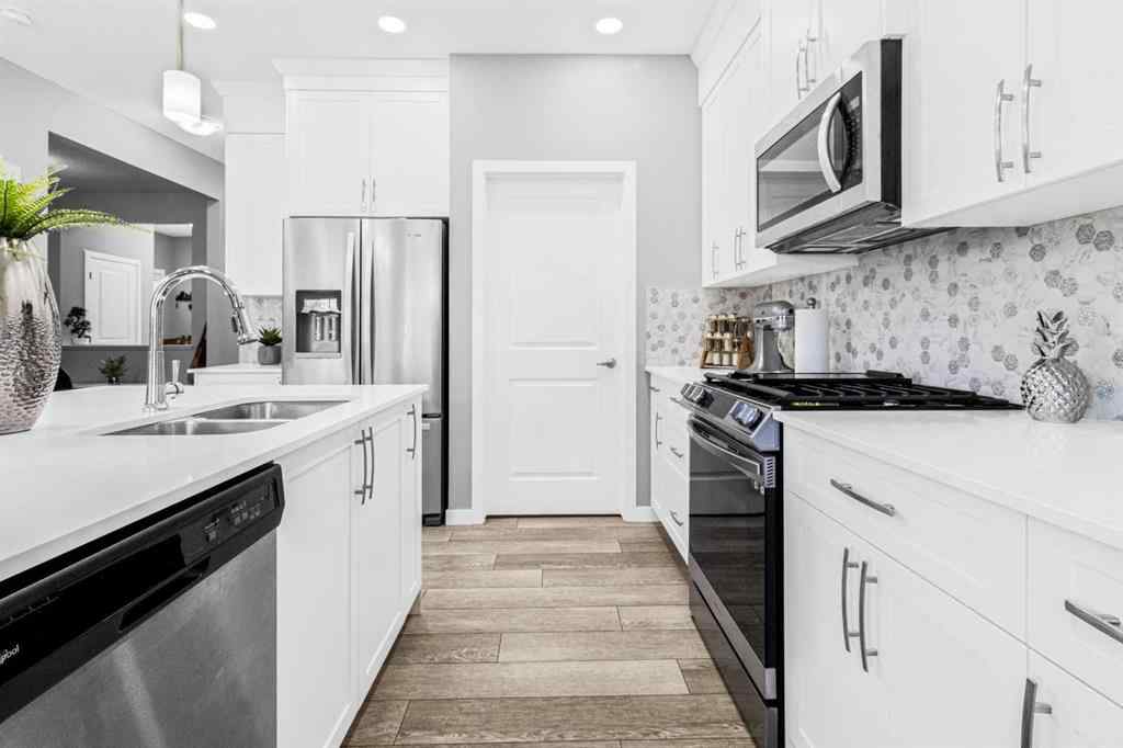 MLS® A2227864 - 1036 Chinook Gate Heath SW in Chinook Gate Airdrie, Residential