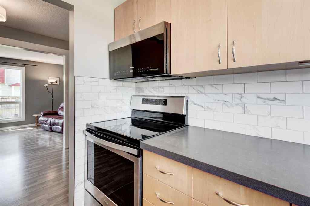 MLS® A2227926 - Unit #43 5425 Pensacola Crescent SE in Penbrooke Meadows Calgary, Residential