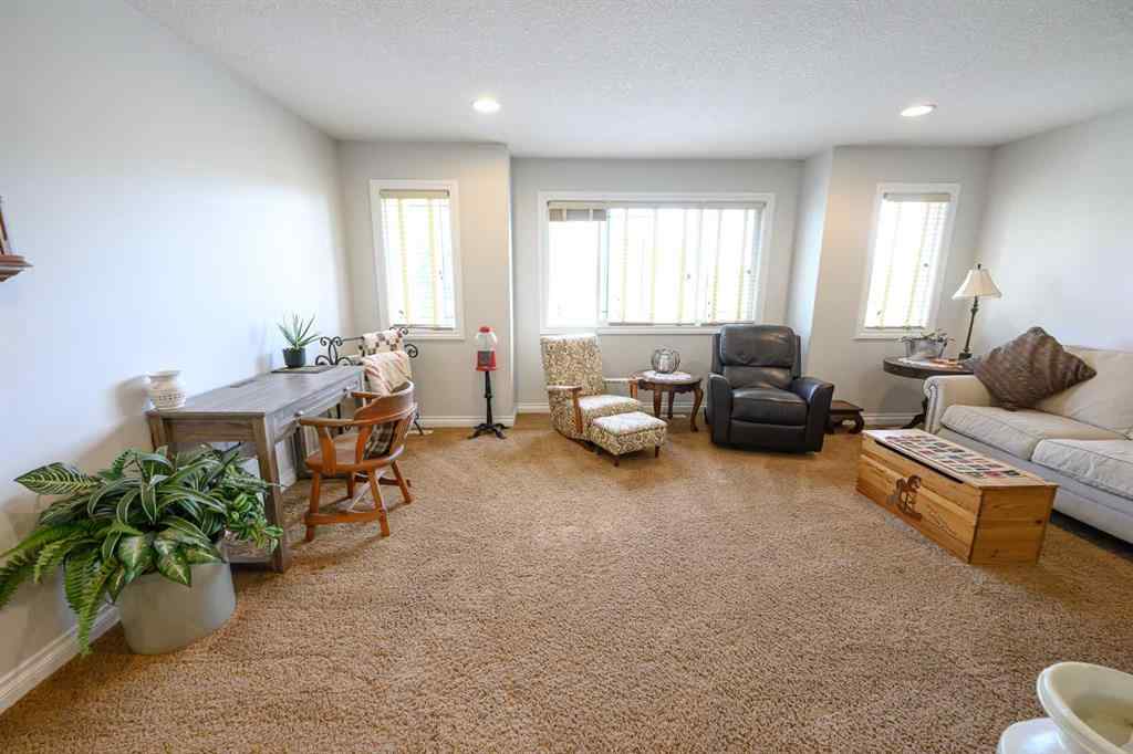 MLS® A2227955 - 10909 65 Avenue  in O\'Brien Lake Grande Prairie, Residential