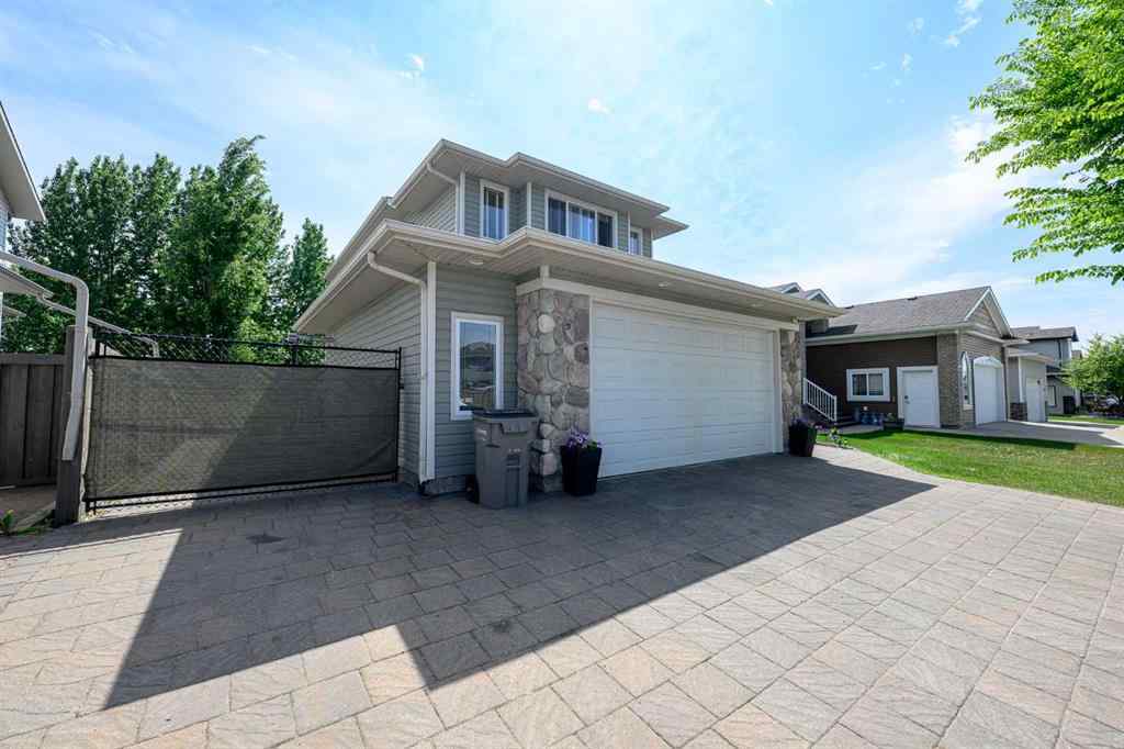 MLS® A2227955 - 10909 65 Avenue  in O\'Brien Lake Grande Prairie, Residential