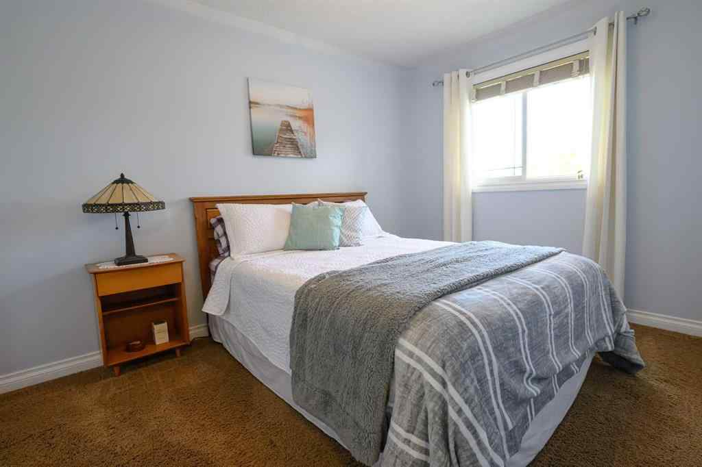 MLS® A2227955 - 10909 65 Avenue  in O\'Brien Lake Grande Prairie, Residential