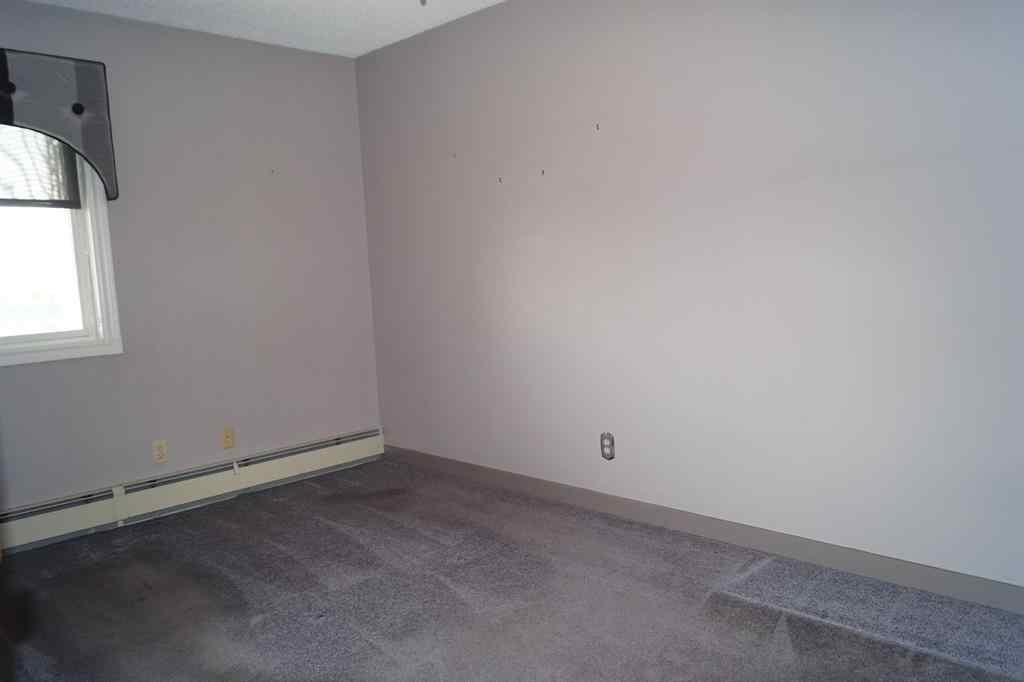 MLS® A2228100 - Unit #407 5007 52 Avenue  in Central Ponoka Ponoka, Residential