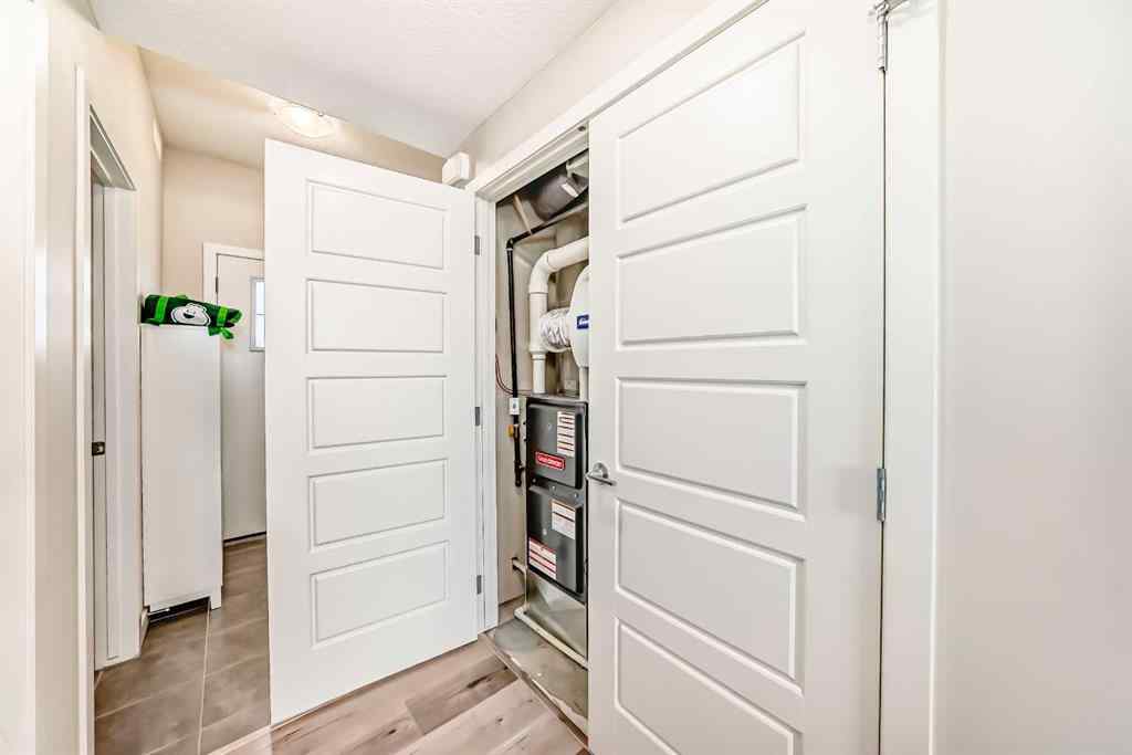 MLS® A2228177 - Unit #104 115 Sagewood Drive SW in Canals Airdrie, Residential