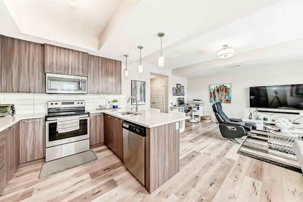MLS® A2228177 - Unit #104 115 Sagewood Drive SW in Canals Airdrie, Residential