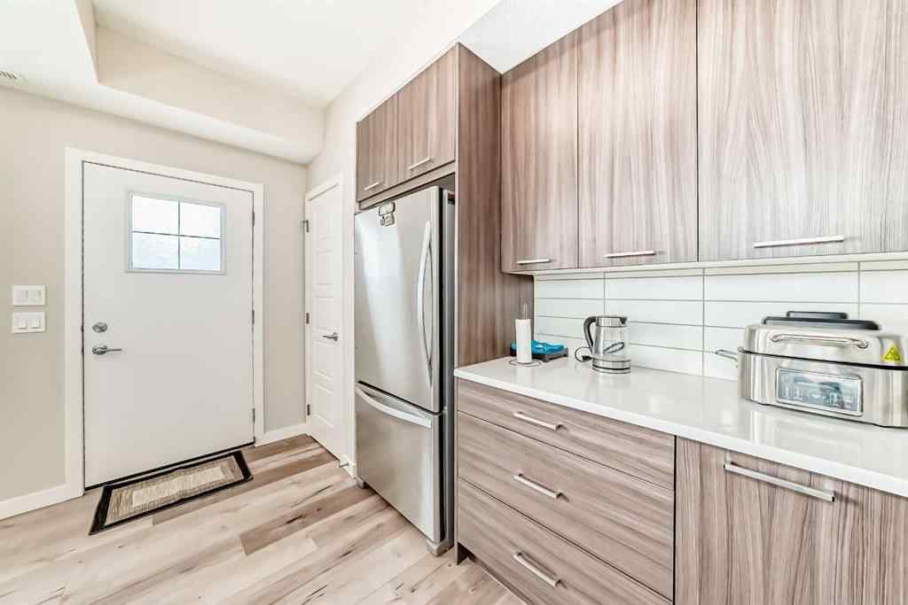 MLS® A2228177 - Unit #104 115 Sagewood Drive SW in Canals Airdrie, Residential