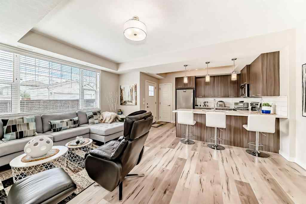 MLS® A2228177 - Unit #104 115 Sagewood Drive SW in Canals Airdrie, Residential