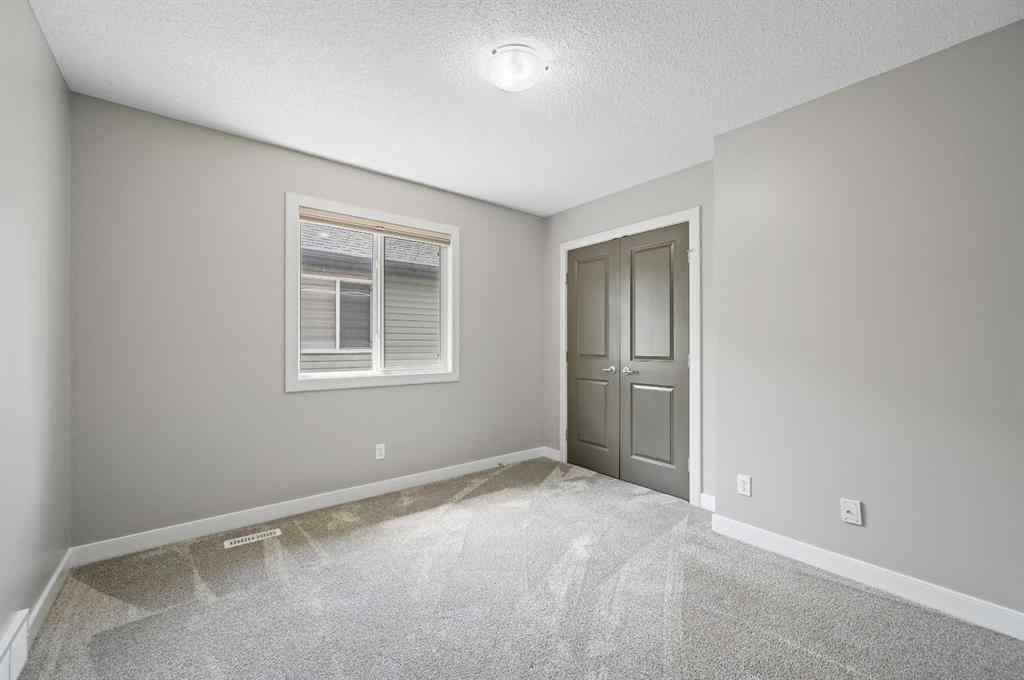 MLS® A2228362 - 102 Ravenscroft Green SE in Ravenswood Airdrie, Residential