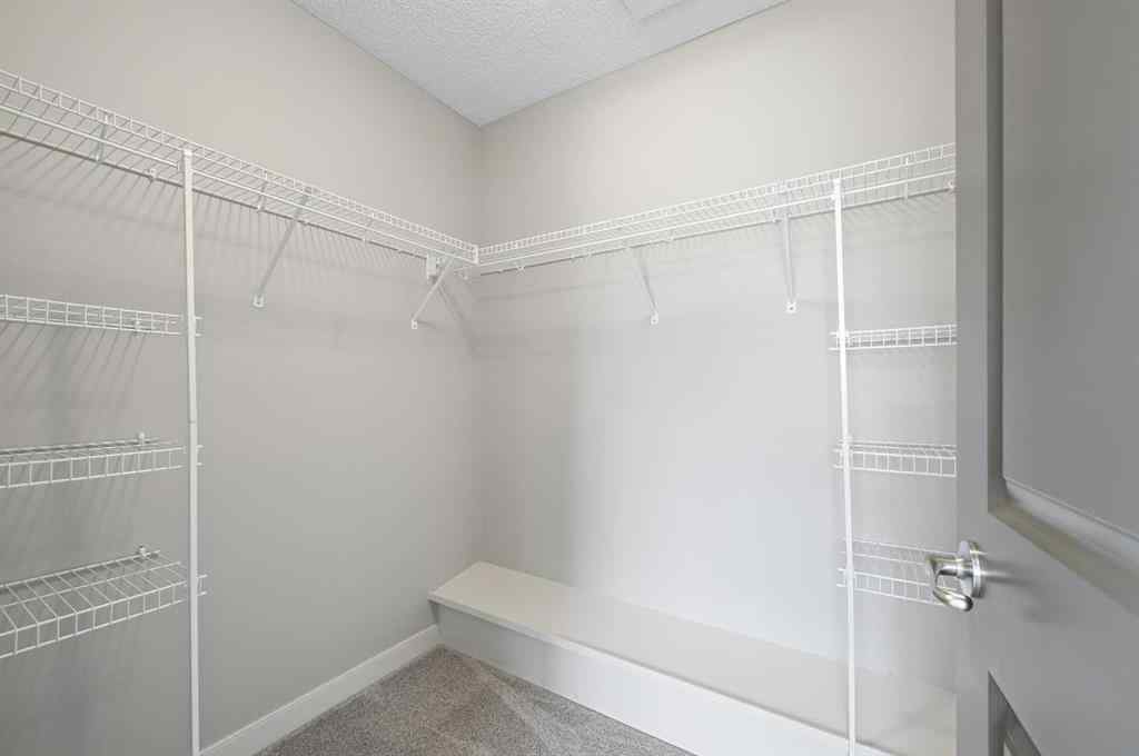 MLS® A2228362 - 102 Ravenscroft Green SE in Ravenswood Airdrie, Residential