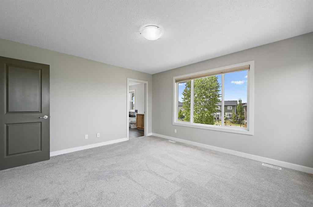 MLS® A2228362 - 102 Ravenscroft Green SE in Ravenswood Airdrie, Residential