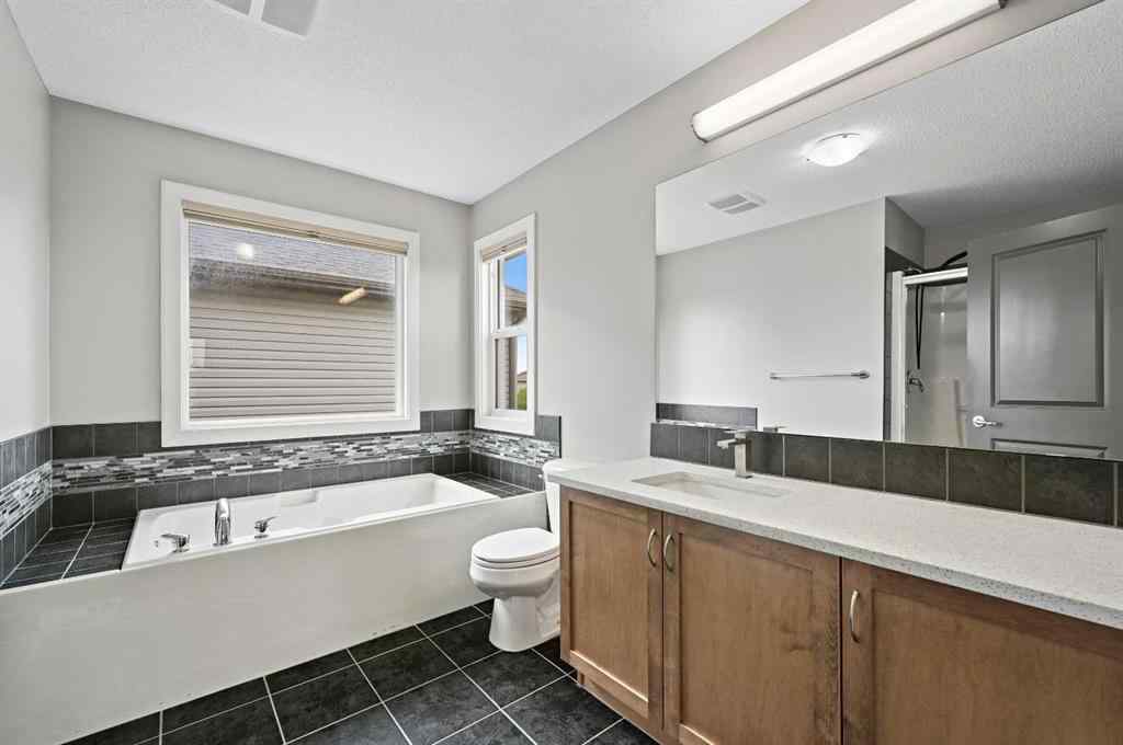 MLS® A2228362 - 102 Ravenscroft Green SE in Ravenswood Airdrie, Residential