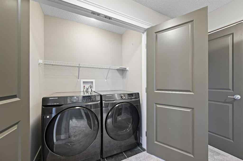 MLS® A2228362 - 102 Ravenscroft Green SE in Ravenswood Airdrie, Residential
