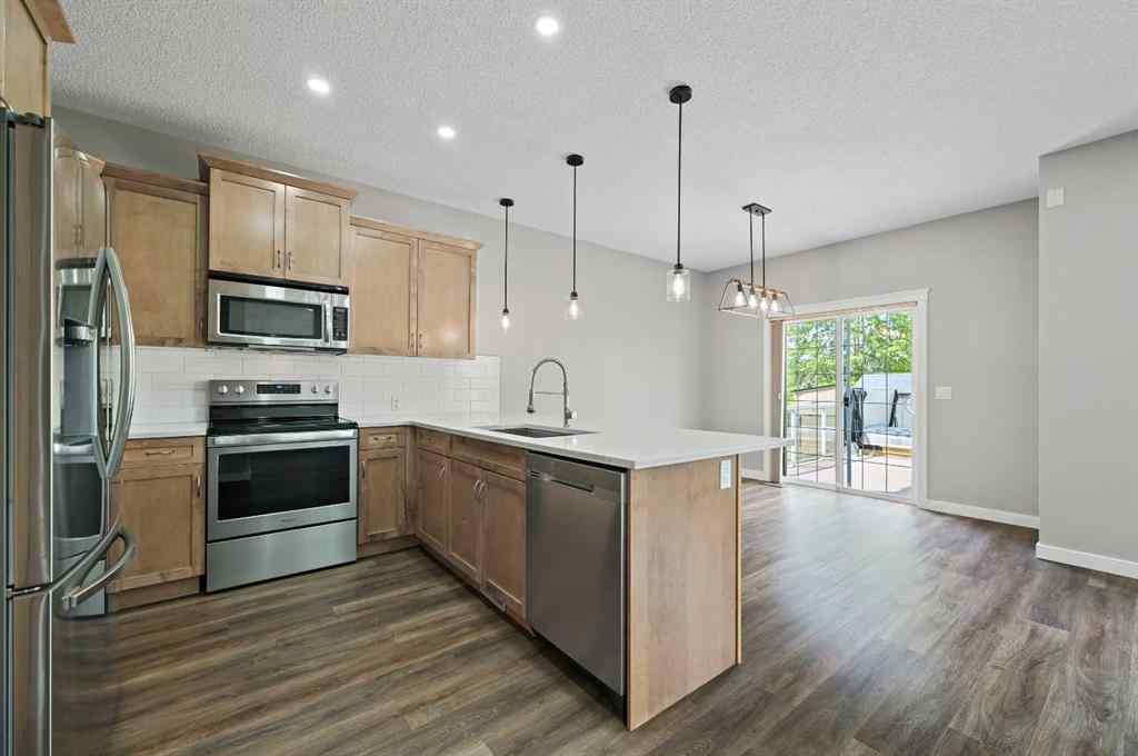 MLS® A2228362 - 102 Ravenscroft Green SE in Ravenswood Airdrie, Residential