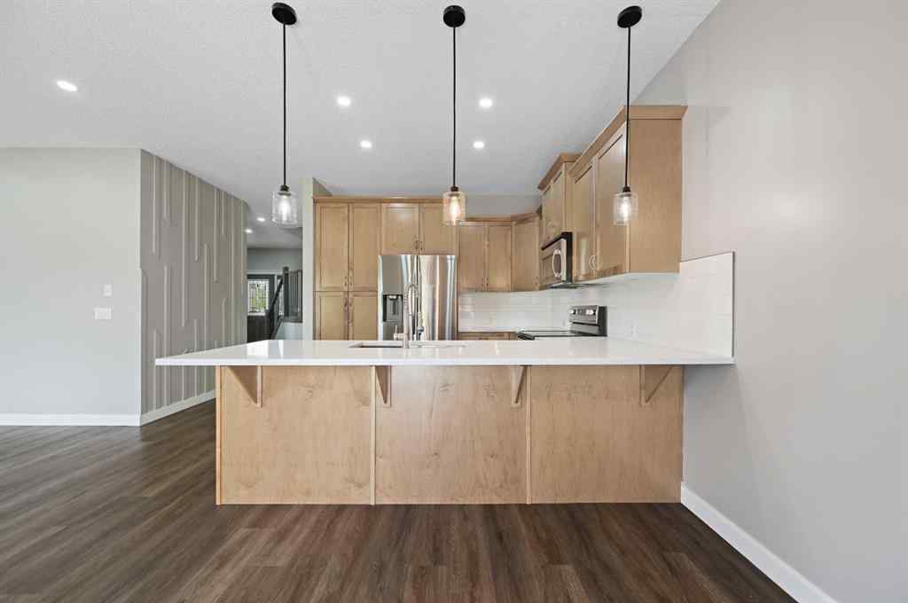 MLS® A2228362 - 102 Ravenscroft Green SE in Ravenswood Airdrie, Residential