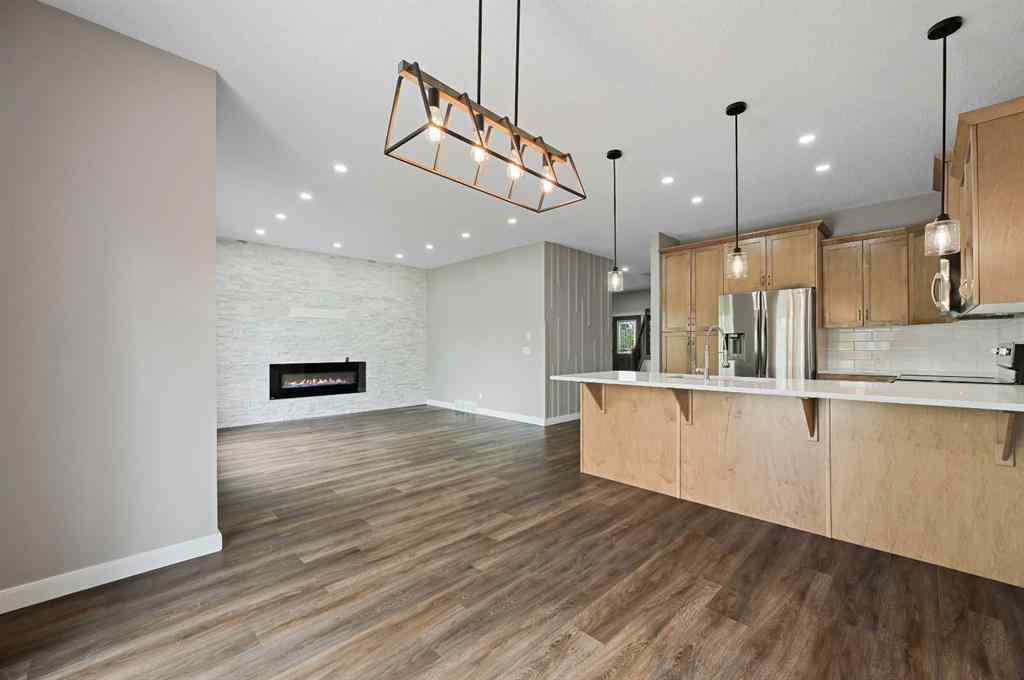 MLS® A2228362 - 102 Ravenscroft Green SE in Ravenswood Airdrie, Residential
