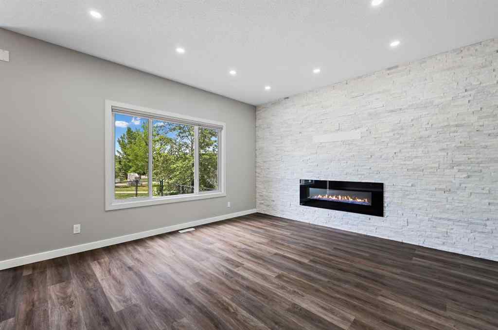 MLS® A2228362 - 102 Ravenscroft Green SE in Ravenswood Airdrie, Residential