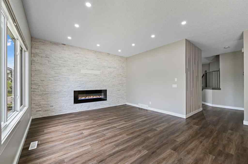 MLS® A2228362 - 102 Ravenscroft Green SE in Ravenswood Airdrie, Residential