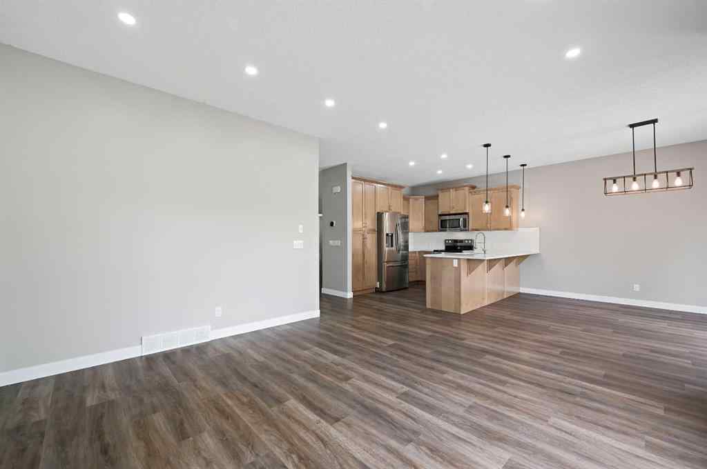 MLS® A2228362 - 102 Ravenscroft Green SE in Ravenswood Airdrie, Residential