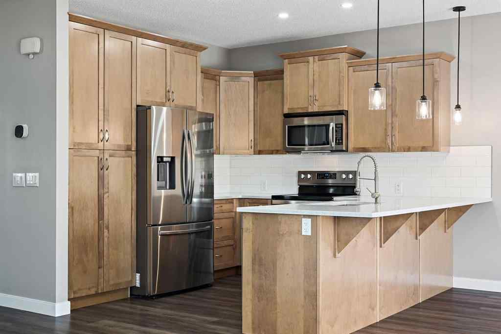 MLS® A2228362 - 102 Ravenscroft Green SE in Ravenswood Airdrie, Residential