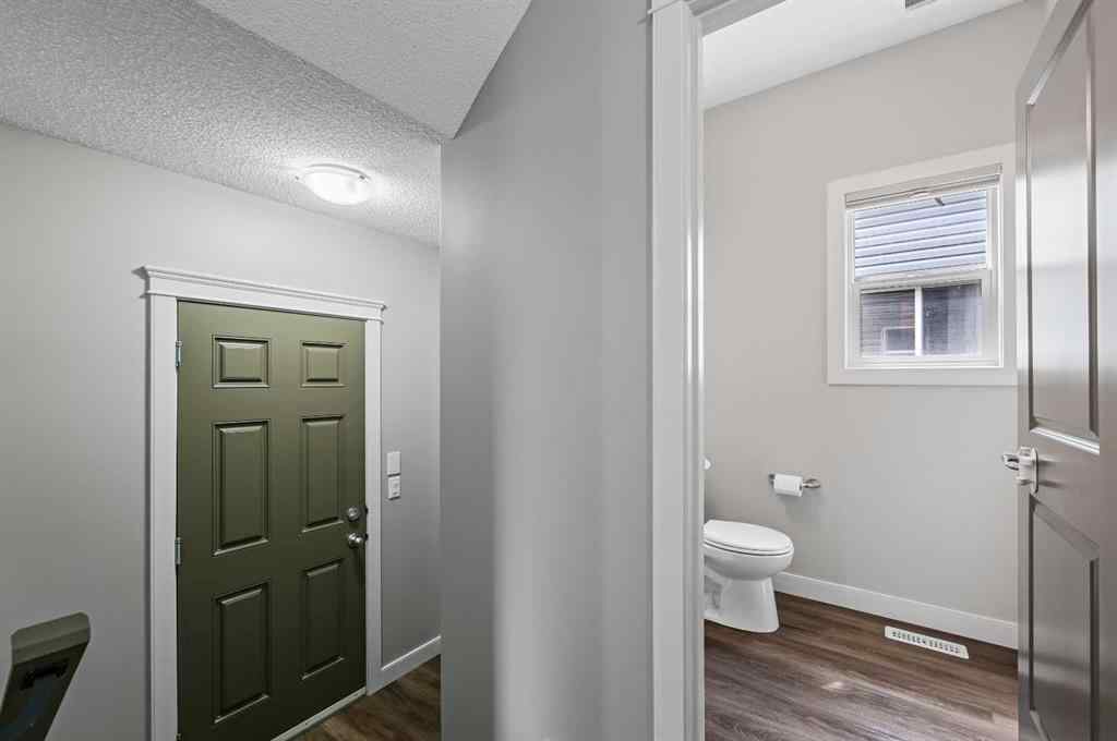 MLS® A2228362 - 102 Ravenscroft Green SE in Ravenswood Airdrie, Residential