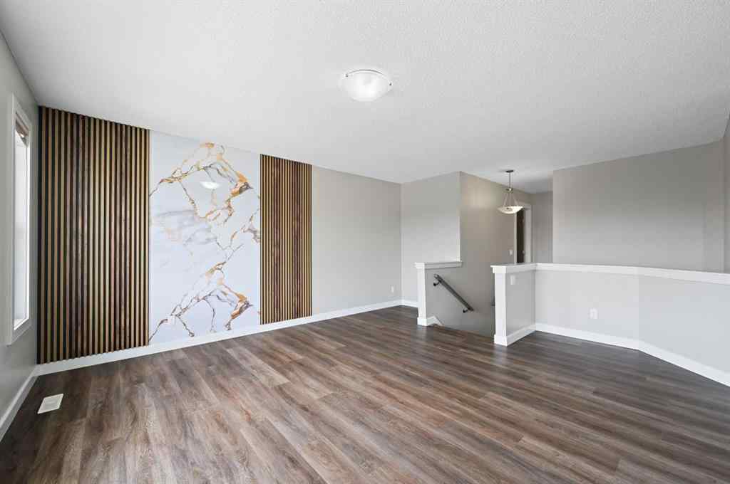 MLS® A2228362 - 102 Ravenscroft Green SE in Ravenswood Airdrie, Residential