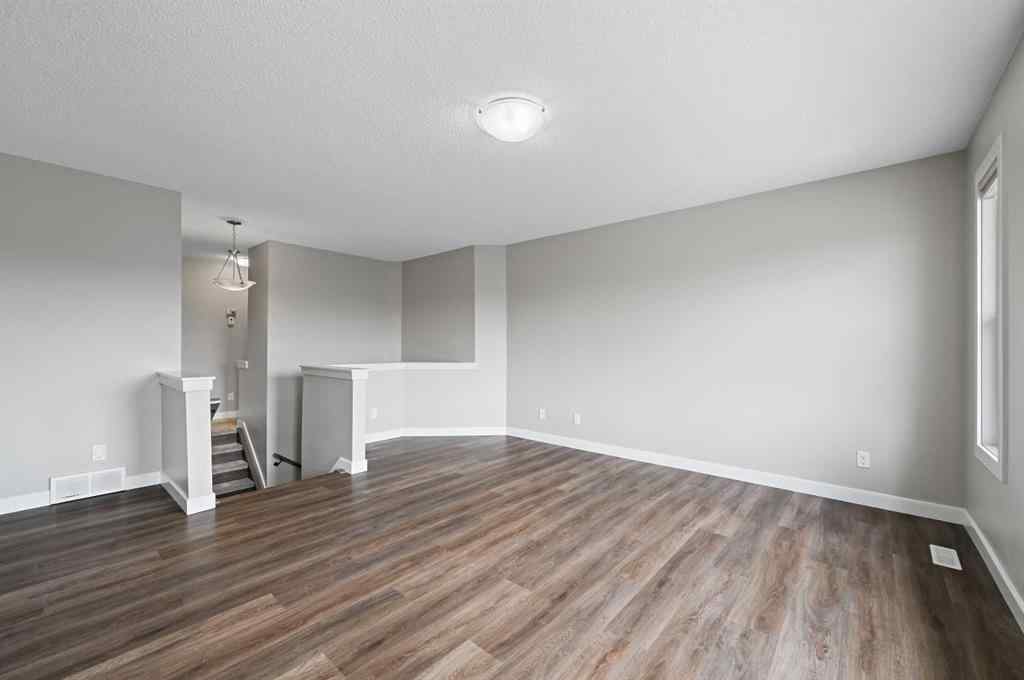MLS® A2228362 - 102 Ravenscroft Green SE in Ravenswood Airdrie, Residential