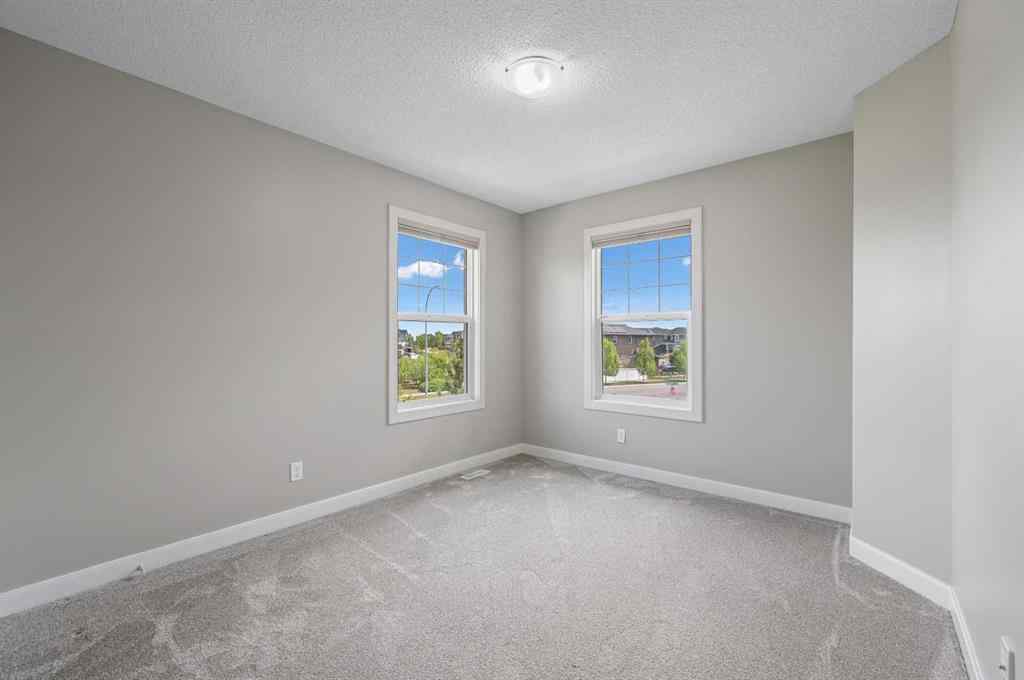 MLS® A2228362 - 102 Ravenscroft Green SE in Ravenswood Airdrie, Residential