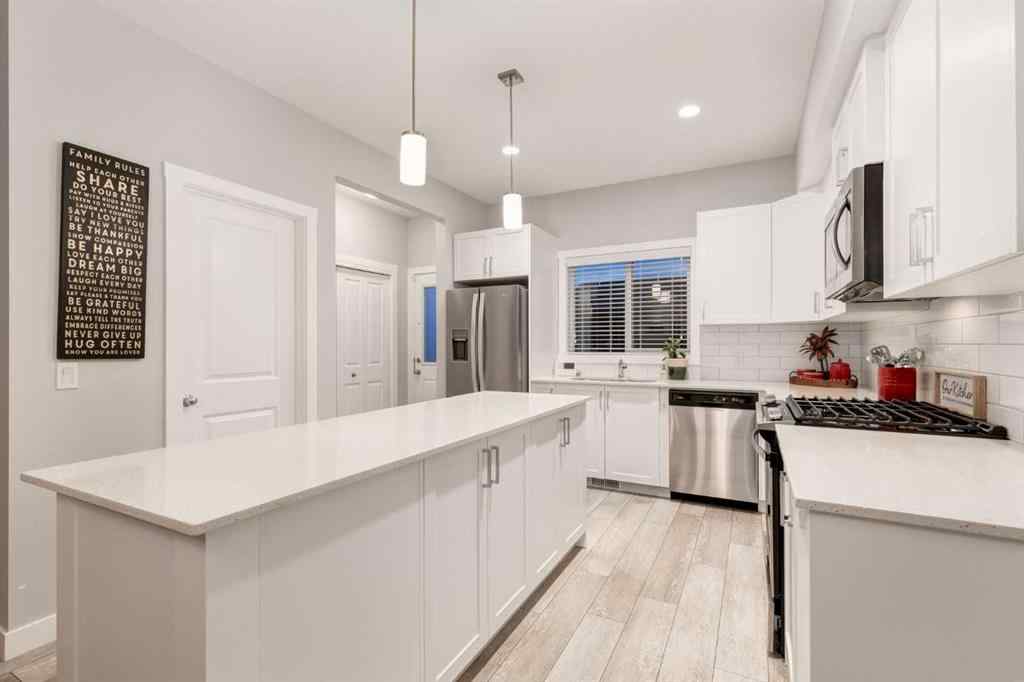 MLS® A2228395 - 1136 MIDTOWN Lane SW in Midtown Airdrie, Residential