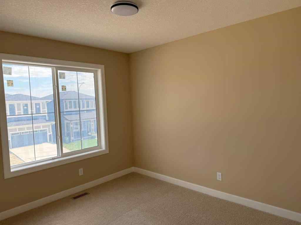 MLS® A2228402 - 91 Sundown Crescent  in Sunset Ridge Cochrane, Residential