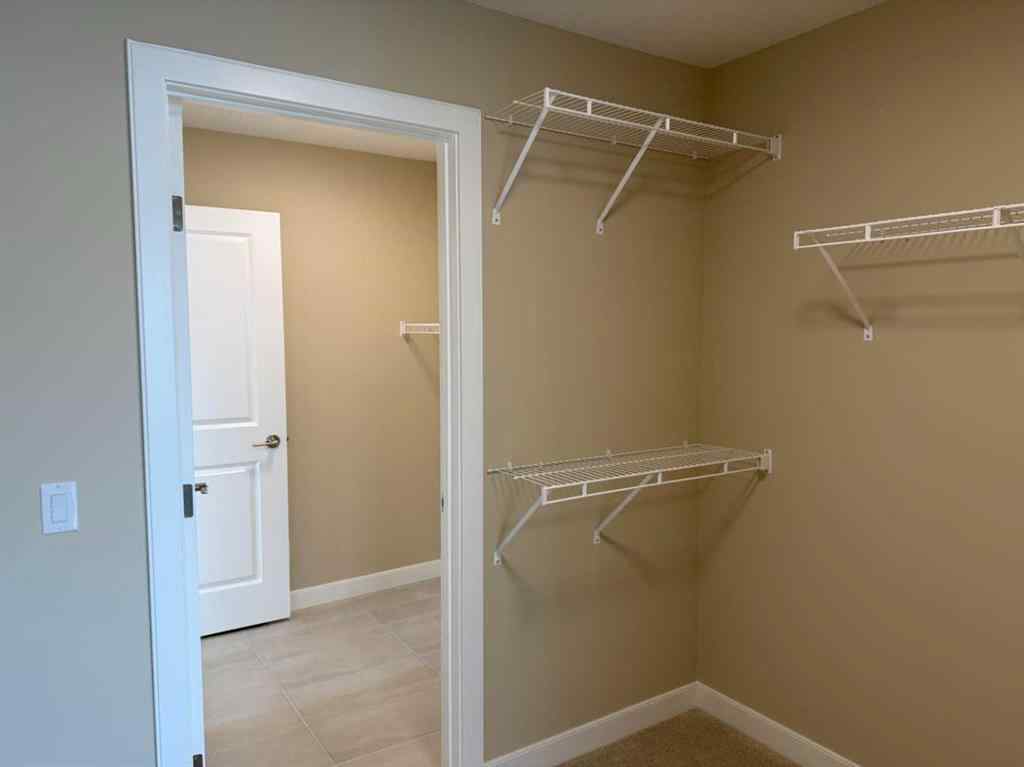 MLS® A2228402 - 91 Sundown Crescent  in Sunset Ridge Cochrane, Residential