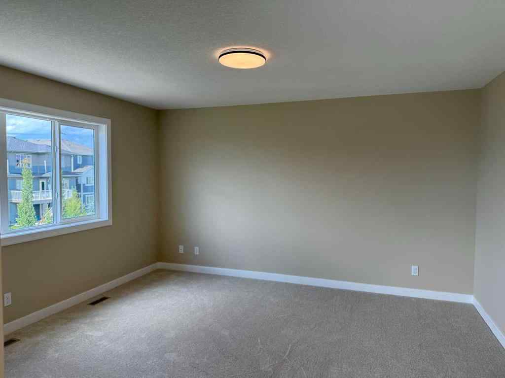 MLS® A2228402 - 91 Sundown Crescent  in Sunset Ridge Cochrane, Residential